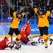 GANGNEUNG, SOUTH KOREA - FEBRUARY 25: Germany's Patrick Hager #50 and Brooks Macek #12 celebrates after a second period goal by Felix Schutz #55 (not shown) on Olympic Athletes from Russia's Vasili Koshechkin #83 with Bogdan Kiselevich #55 looking on during gold medal round action at the PyeongChang 2018 Olympic Winter Games. (Photo by Matt Zambonin/HHOF-IIHF Images)

